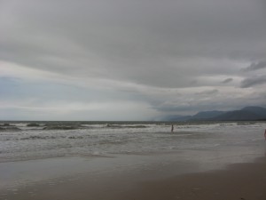 Liz about to enjoy the waves on Four Mile Beach